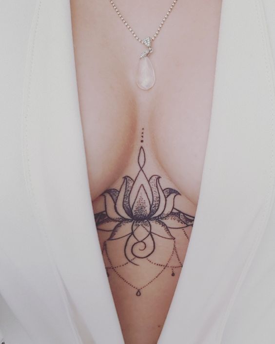 carlye hay recommends Between The Boobs Tattoo