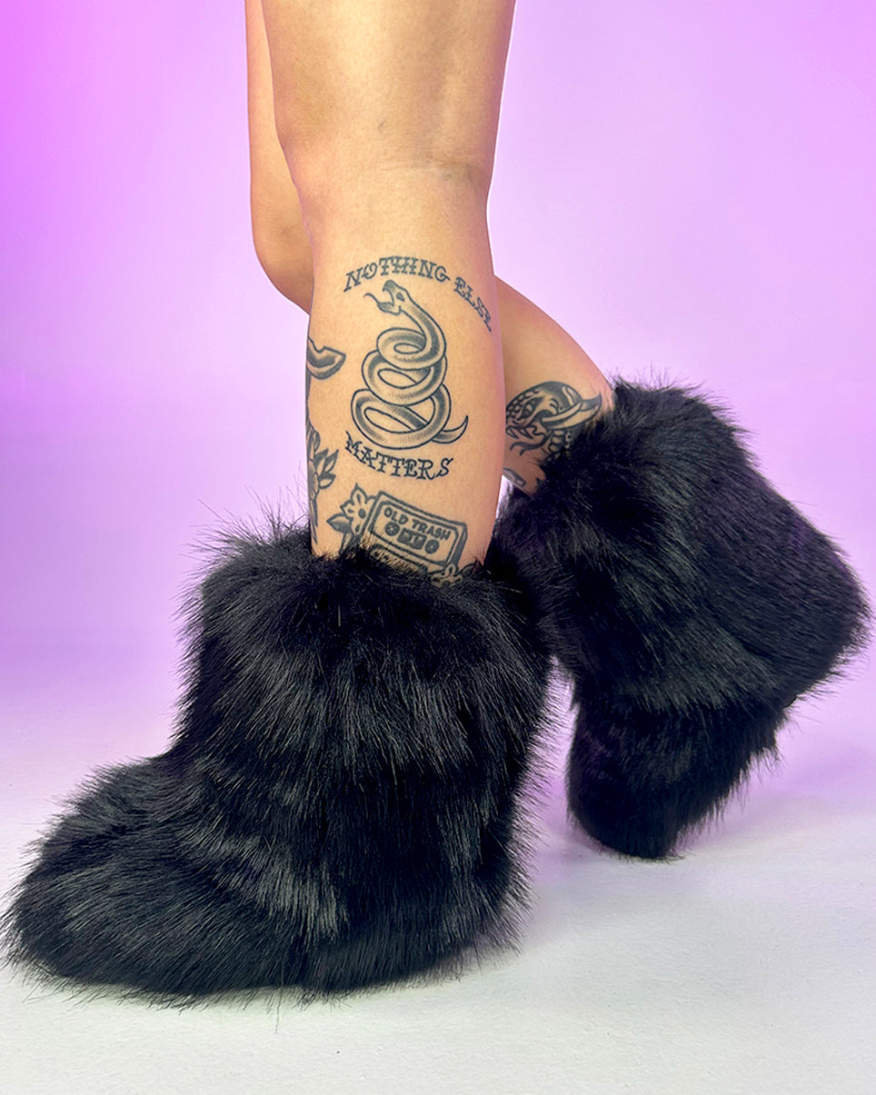 adrian orgas share big fluffy fur boots photos
