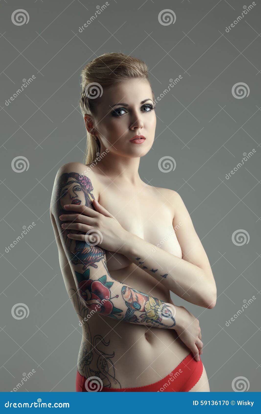 nude woman with tattoos