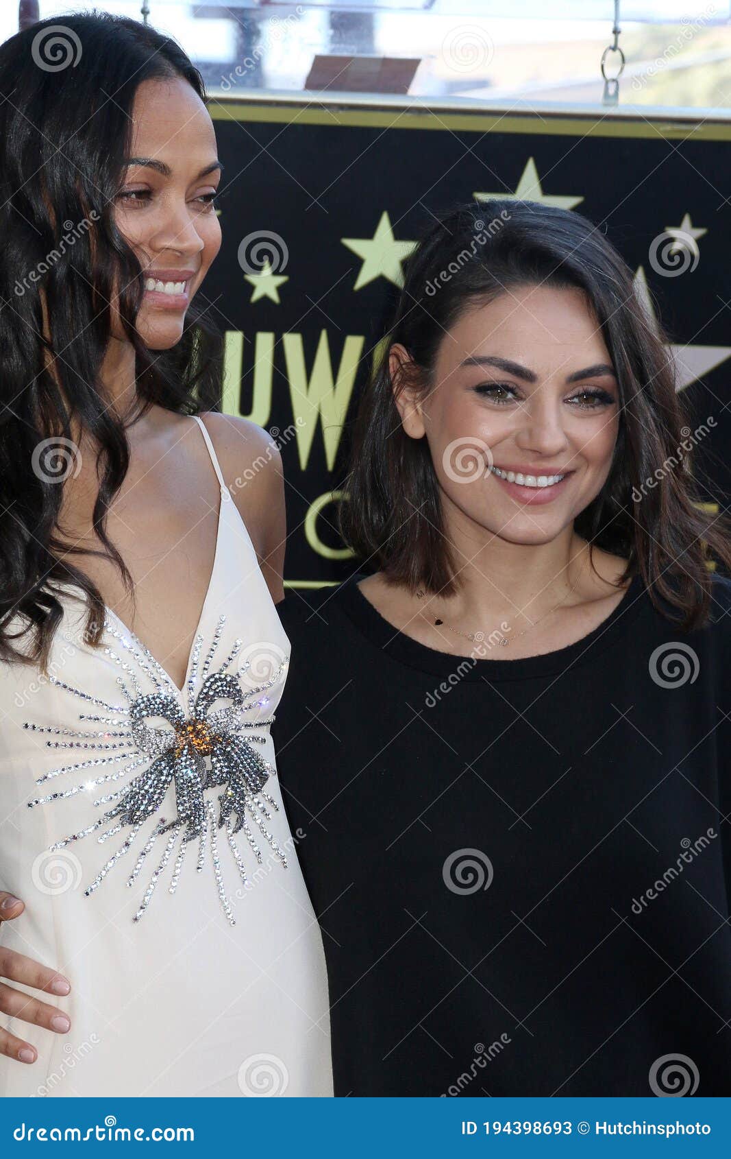 andre beer share mila kunis and zoe saldana photos