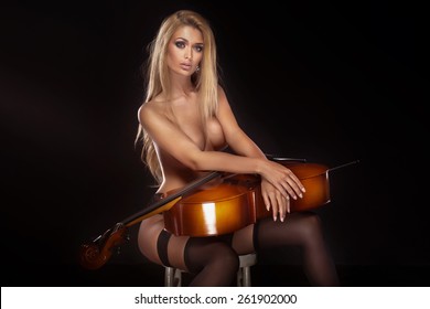 Nude Woman Playing The Violin sex scissoring