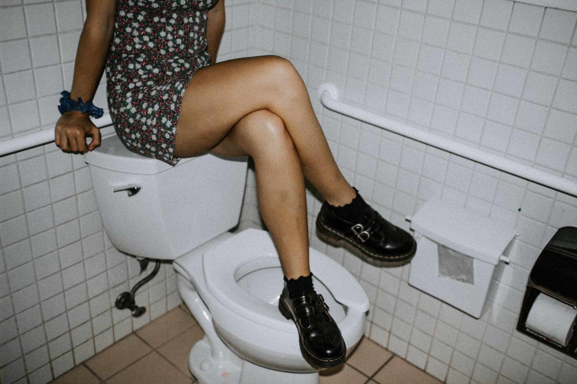 girl pissing in toilet