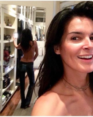 brett timberlake share angie harmon nip slip photos