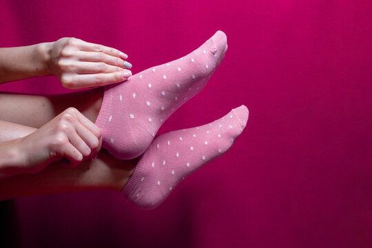 girl gets pink sock