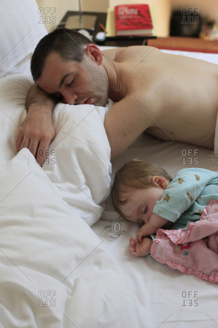 dad and daughter sleeping