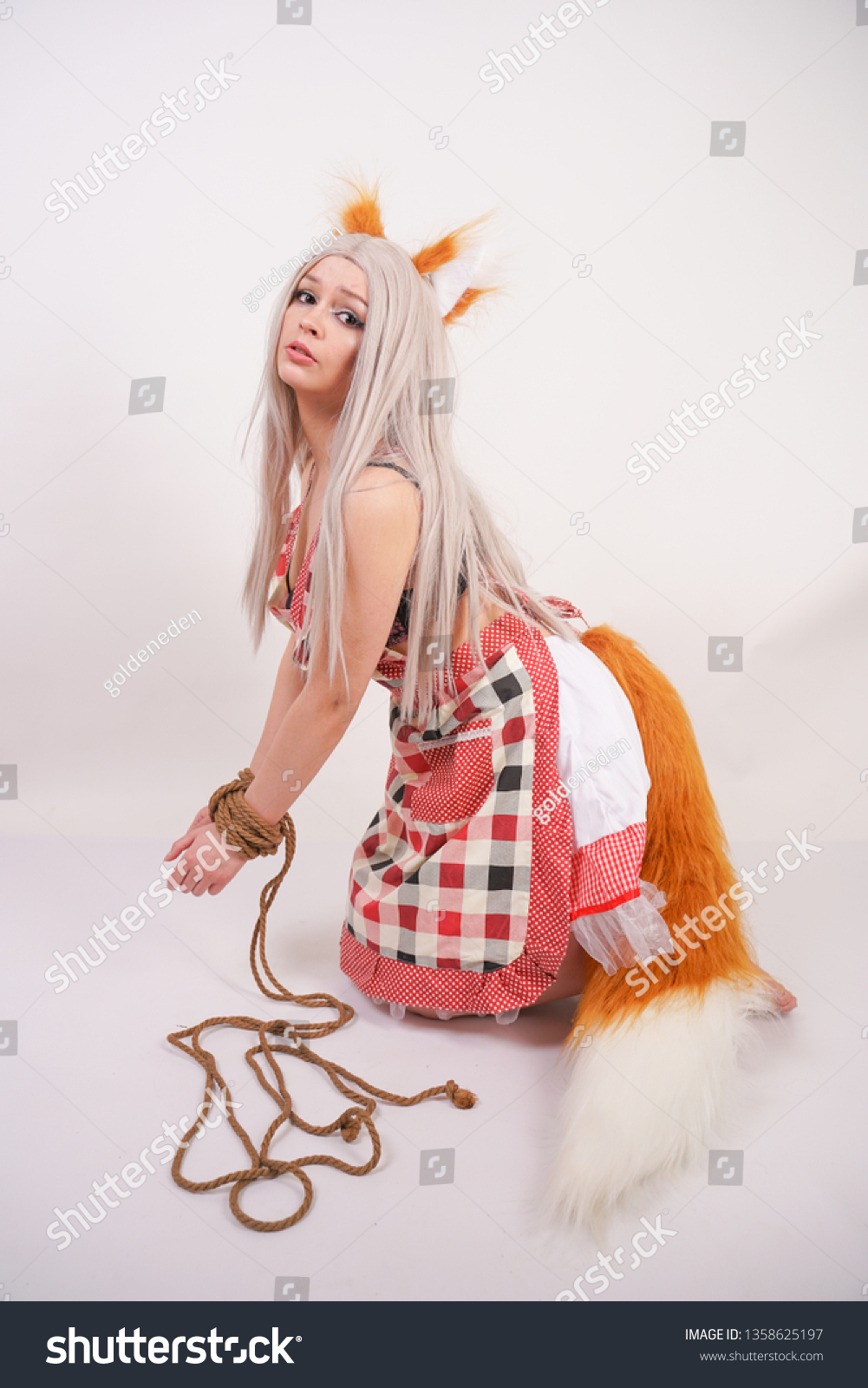 Girl With Fox Tail on balls
