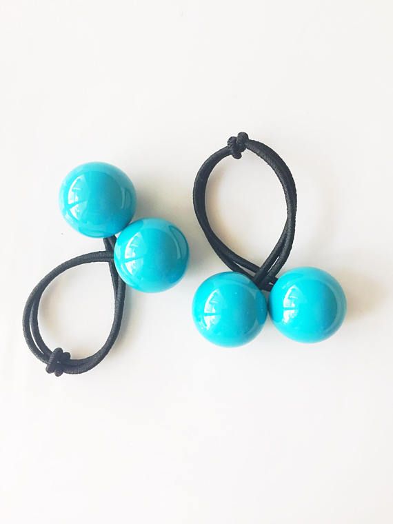 Hair Tie Around Balls grasped concept