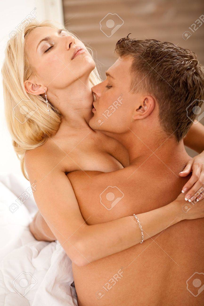 passionate couple in bed