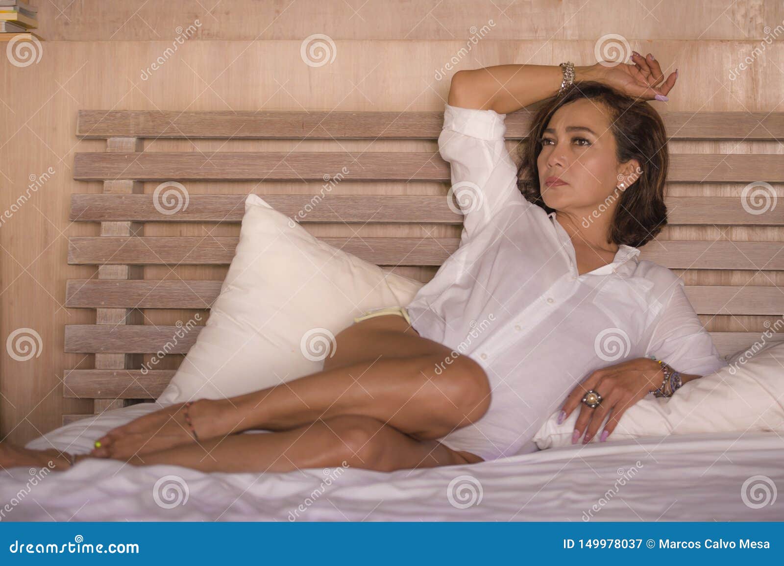 pictures of women in bed